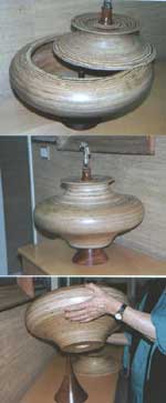 image of large covered rotating plywood bowl